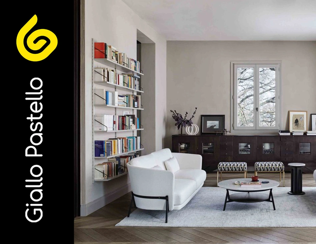 Arredare un soggiorno piccolo: soggiorno con libreria - Giallo Pastello Interior Design